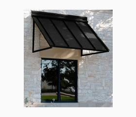 Black metal awning over a window on a stone building