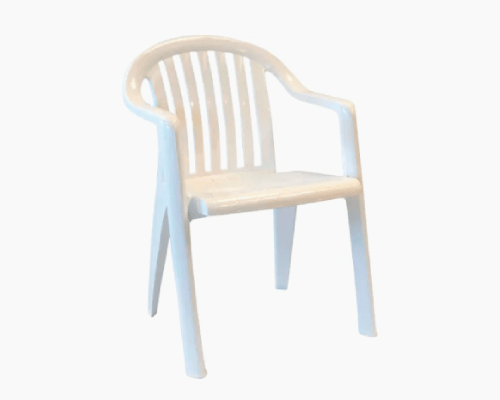 White resin stackable chair with slatted backrest and armrests.